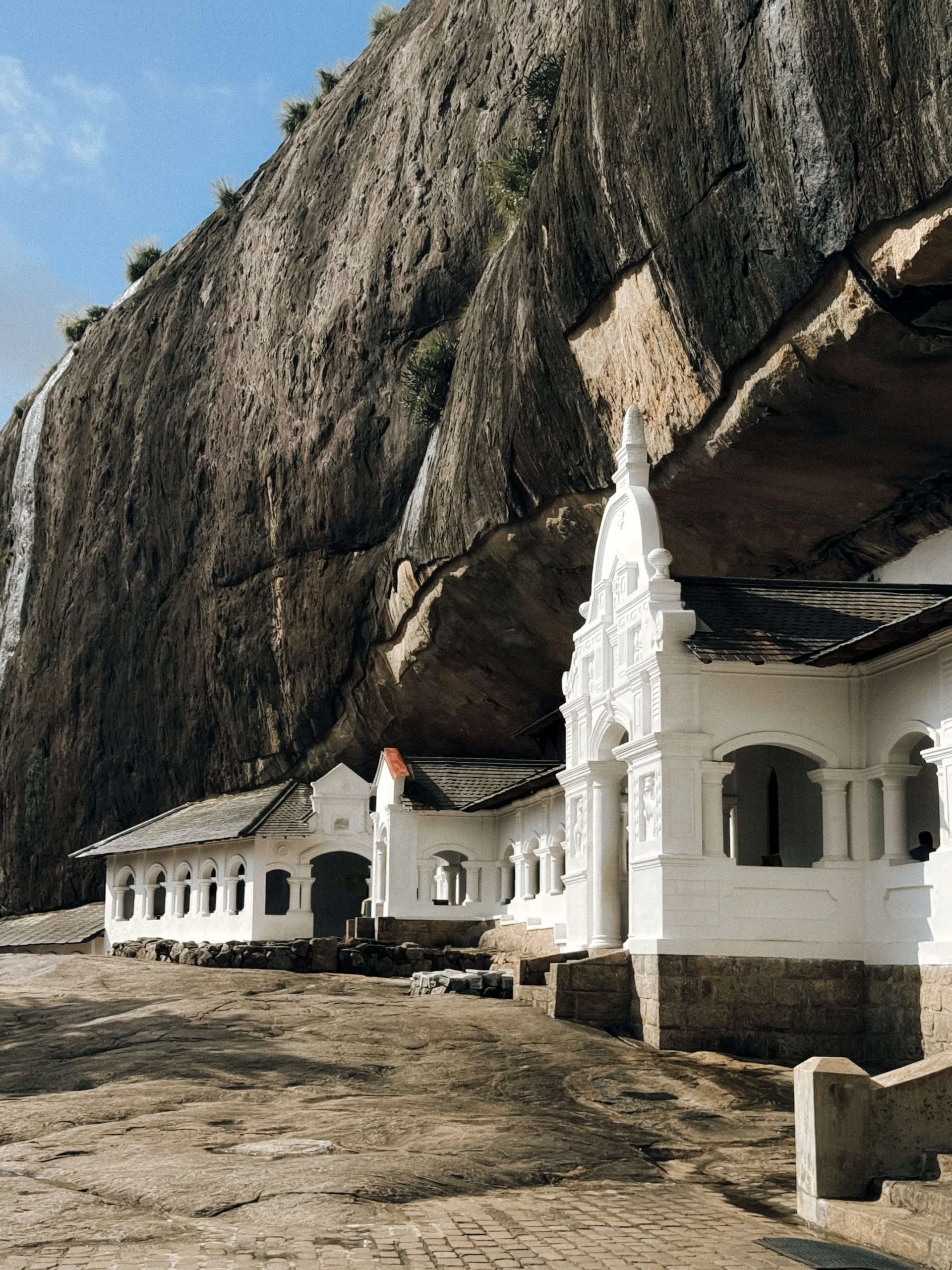 Golden Dambulla Cave Temple and Buddhist statues in Sri Lanka